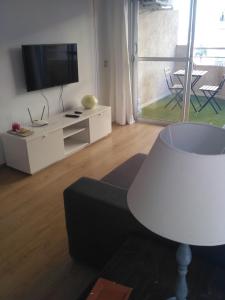 TV a/nebo společenská místnost v ubytování Apartamento Puertoplaya I