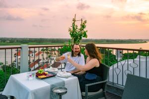 Photo de la galerie de l'établissement Cozy Savvy Boutique Hotel Hoi An, à Hội An