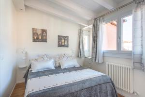 Posteľ alebo postele v izbe v ubytovaní Venice Luxury Terrace View of San Marco