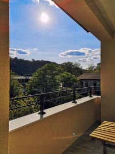 a balcony with a view of the sky at Tsarevets Apartament-Veliko Tarnovo in Veliko Tŭrnovo
