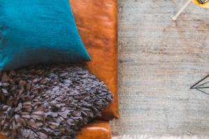 a close up of a pile of sunflower seeds in a leather case at L'ATELIER KEYWEEK Vintage Duplex Apartment with Parking Biarritz Center in Biarritz