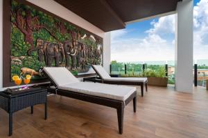 Balkón nebo terasa v ubytování The Thames Pool Access Resort & Villa - SHA Extra Plus