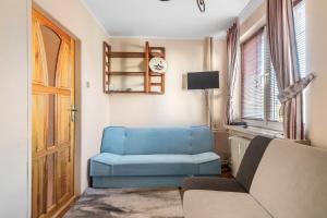 Posezení v ubytování Mieszkanie Przy Wieżach