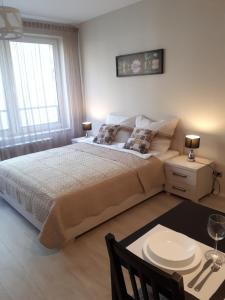 Postel nebo postele na pokoji v ubytování Vena apartment