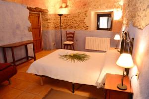 En eller flere senge i et værelse på Can Marisch Les Corts + 13 billeder