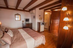 Letto o letti in una camera di 22 THE STRADUN