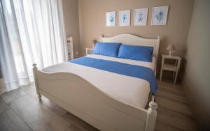 Postel nebo postele na pokoji v ubytování Torrelama Room & Breakfast