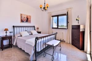 A bed or beds in a room at Villa Vidal