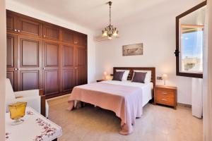 A bed or beds in a room at Villa Vidal