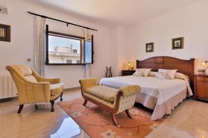A bed or beds in a room at Villa Vidal