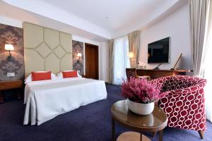 TV in/ali zabaviščno središče v nastanitvi Hotel Ziya