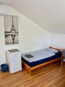 A bed or beds in a room at Pohoda Ubytovanie Stupava