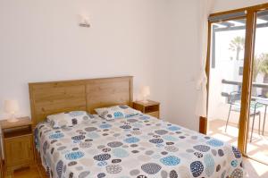 Postel nebo postele na pokoji v ubytování B16-Dúplex luminoso+ piscina a 150 m del mar