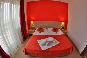 Postel nebo postele na pokoji v ubytování Hotel Putnik