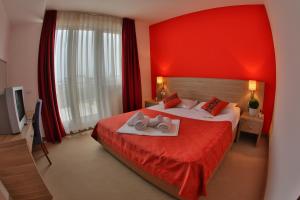 Postel nebo postele na pokoji v ubytování Hotel Putnik