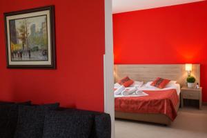 Postel nebo postele na pokoji v ubytování Hotel Putnik