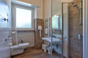 Koupelna v ubytování Hotel Roma