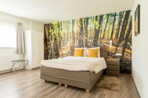 Postel nebo postele na pokoji v ubytování Hotel-Restaurant de Boer'nkinkel