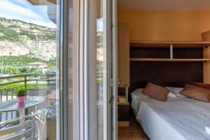 Postel nebo postele na pokoji v ubytování Hotel Roma + 37 fotografií