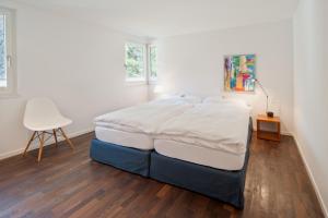 Postel nebo postele na pokoji v ubytování Chalet Altesse - Premium Apartments