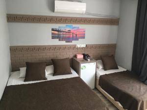 Krevet ili kreveti u jedinici u objektu Asus Palmiye Otel