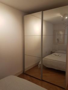 Posteľ alebo postele v izbe v ubytovaní Chic apartment