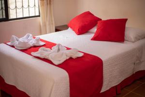 Voodi või voodid majutusasutuse Hostal Gladismar toas