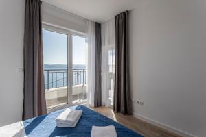 Postel nebo postele na pokoji v ubytování Villa Maya + 37 fotografií