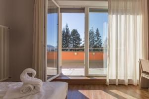 Postel nebo postele na pokoji v ubytování Hotel Milano + 36 fotografií