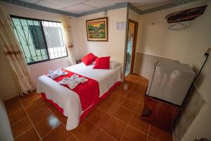 Voodi või voodid majutusasutuse Hostal Gladismar toas