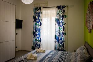Giường trong phòng chung tại Mimma’s house Monteverde