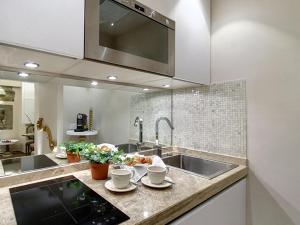 Una cocina o cocineta en Piccolo Signoria Apartment