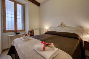 Posteľ alebo postele v izbe v ubytovaní Charming Fiesolana Apartment in heart of Florence