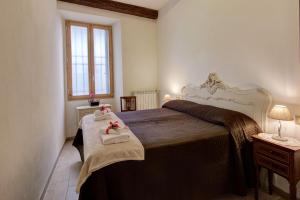 Posteľ alebo postele v izbe v ubytovaní Charming Fiesolana Apartment in heart of Florence