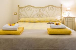 Posteľ alebo postele v izbe v ubytovaní Charming Fiesolana Apartment in heart of Florence