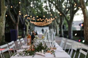 a table with wine bottles and glasses on it at La Féraude - Pays d'Aix en Provence in Gardanne +27 photos