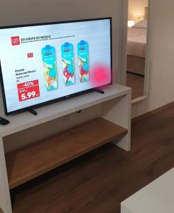 TV a/nebo společenská místnost v ubytování Laganini, studio apartman 3 FLOWER