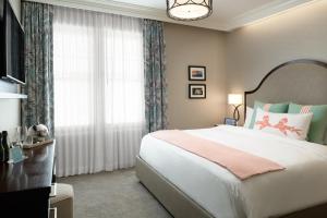 Ein Bett oder Betten in einem Zimmer der Unterkunft Hotel Atwater