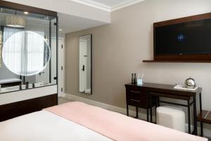 Ein Bett oder Betten in einem Zimmer der Unterkunft Hotel Atwater