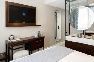 Ein Bett oder Betten in einem Zimmer der Unterkunft Hotel Atwater