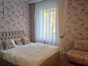 Postel nebo postele na pokoji v ubytování Dom Rabinovicha