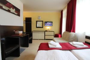 Posteľ alebo postele v izbe v ubytovaní Apartmán Eden