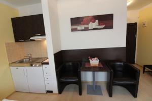 Kuchyňa alebo kuchynka v ubytovaní Apartmán Eden