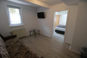 Postel nebo postele na pokoji v ubytování Pension Haus Butz