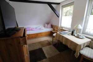 Postel nebo postele na pokoji v ubytování Pension Haus Butz