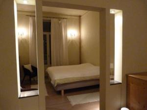 Uma cama ou camas num quarto em B&B Sparrow's Nest