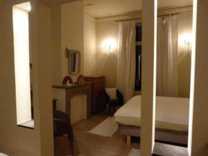Uma cama ou camas num quarto em B&B Sparrow's Nest