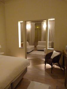 Uma cama ou camas num quarto em B&B Sparrow's Nest