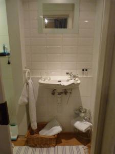 Uma casa de banho em B&B Sparrow's Nest