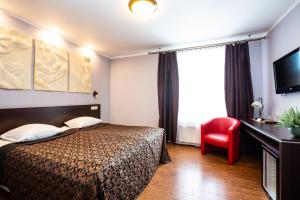 Postel nebo postele na pokoji v ubytování Primo Hotel
